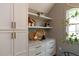 Dining area features white cabinets, granite countertops, and decorative woven baskets at 408 E Maynard Ave, Durham, NC 27704