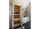 Well-organized pantry with adjustable shelves and pull-out drawers, offering versatile storage solutions at 408 E Maynard Ave, Durham, NC 27704