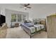 Bedroom with carpet, a ceiling fan and natural light at 4137 Lofty Ridge Pl, Morrisville, NC 27560