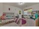 Bedroom featuring a window, bed, rug, and whimsical decor at 4137 Lofty Ridge Pl, Morrisville, NC 27560