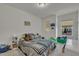 Bright bedroom with natural light and a teddy bear on the bed at 4137 Lofty Ridge Pl, Morrisville, NC 27560
