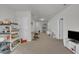 Bonus room featuring carpet, neutral paint, and a shelf of toys at 4137 Lofty Ridge Pl, Morrisville, NC 27560