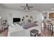 Inviting living area featuring modern decor, hardwood floors, and a comfortable sofa at 4137 Lofty Ridge Pl, Morrisville, NC 27560