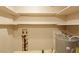 View of basement with water heater and exposed utilities at 414 N Cypress St, Wendell, NC 27591