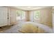 Bright, airy room with multiple windows, presenting a blank canvas for creating a comfortable living area at 414 N Cypress St, Wendell, NC 27591
