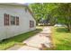 A view of the side of the property showing the driveway and exterior at 414 N Cypress St, Wendell, NC 27591