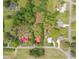 Aerial view highlighting the property within the surrounding tree-lined neighborhood at 429 N Asheboro St, Liberty, NC 27298