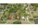 Aerial view of the neighborhood showcasing land, houses, and natural beauty at 429 N Asheboro St, Liberty, NC 27298