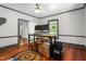 Versatile room with hardwood floors at 429 N Asheboro St, Liberty, NC 27298