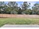 Large backyard with a newly stained wood fence offers privacy and security at 4405 Aubaun Way, Knightdale, NC 27545