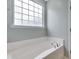 Soaking tub with chrome fixtures and window for natural light in bathroom at 4405 Aubaun Way, Knightdale, NC 27545