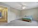 Large bedroom with neutral walls, ceiling fan, carpet and natural light at 4405 Aubaun Way, Knightdale, NC 27545