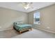 Neutral bedroom with ceiling fan, and window for lots of natural light at 4405 Aubaun Way, Knightdale, NC 27545