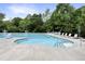 Large community pool with ample lounge seating, providing a refreshing oasis for residents at 4405 Aubaun Way, Knightdale, NC 27545