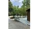 Backyard deck with views of wooded lot at 5601 Plum Nearly Ct, Raleigh, NC 27610