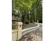 Landscaped backyard with a wooden deck at 5601 Plum Nearly Ct, Raleigh, NC 27610