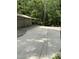Spacious three-car garage with covered parking providing ample space for vehicles and storage at 5601 Plum Nearly Ct, Raleigh, NC 27610