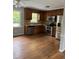 Classic kitchen with wood cabinets, stainless steel appliances, and hardwood floors at 5601 Plum Nearly Ct, Raleigh, NC 27610