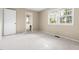 Bedroom offering carpet floors and access to an ensuite bathroom at 5802 Newhall Rd, Durham, NC 27713