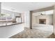 Bright kitchen with granite counters, and white appliances, adjacent to the living area at 5802 Newhall Rd, Durham, NC 27713