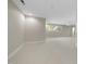 Spacious bonus room with recessed lighting and neutral carpet provides ample space for recreation and relaxation at 6000 Canadero Dr, Raleigh, NC 27612
