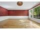 Dining room showcases hardwood floors, decorative wallpaper, and detailed ceilings at 6000 Canadero Dr, Raleigh, NC 27612