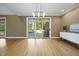 Dining room features a large sliding door and a white sideboard at 6000 Canadero Dr, Raleigh, NC 27612