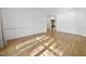 Living room features hardwood floors, chair rail and beautiful natural light at 6000 Canadero Dr, Raleigh, NC 27612
