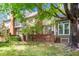 Home features a backyard with grass and trees at 6000 Tenter Banks Sq, Raleigh, NC 27609