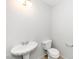 Bathroom includes decorative sink and toilet at 6000 Tenter Banks Sq, Raleigh, NC 27609