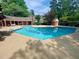 Large community pool with ample lounge space and clubhouse nearby at 6000 Tenter Banks Sq, Raleigh, NC 27609