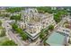 Aerial view of a modern condominium with retail space on the ground floor in an urban setting at 601 W Rosemary St # 905, Chapel Hill, NC 27516