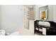 Modern bathroom boasts sleek fixtures, stone countertop, and a walk-in shower at 601 W Rosemary St # 905, Chapel Hill, NC 27516