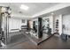 Well-equipped gym with weight machines and dumbbells at 601 W Rosemary St # 905, Chapel Hill, NC 27516