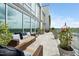 This amazing patio is fully furnished with comfortable seating, greenery and panoramic views at 601 W Rosemary St # 905, Chapel Hill, NC 27516