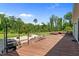 Backyard features a large deck, patio area, and manicured lawn, perfect for outdoor gatherings at 675 Anderson Creek Rd, Henderson, NC 27537