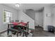 Cozy dining room with dark wood table, seating for six, stylish rug, and plenty of natural light at 675 Anderson Creek Rd, Henderson, NC 27537