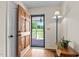 Welcoming entryway with hardwood floors and an open door, creating a warm first impression at 675 Anderson Creek Rd, Henderson, NC 27537
