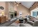 Inviting living room featuring stone fireplace, comfortable seating, and stylish decor at 675 Anderson Creek Rd, Henderson, NC 27537