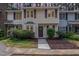 Inviting townhome with a well-maintained front yard and charming curb appeal at 7015 Staghorn Ln, Raleigh, NC 27615