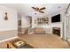 Bright and airy living room with comfortable seating and staircase access at 7015 Staghorn Ln, Raleigh, NC 27615