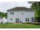 Backyard featuring home's exterior, patio, trampoline, and green lawn at 71 Hunters Way, Angier, NC 27501