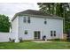 Spacious backyard with a well-maintained lawn, patio, and privacy fence, ideal for outdoor enjoyment at 71 Hunters Way, Angier, NC 27501