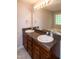 Bathroom features a jacuzzi tub and double sink vanity with granite countertop at 71 Hunters Way, Angier, NC 27501