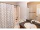 Clean bathroom with shower, tub combo, granite counter, and great vanity mirror at 71 Hunters Way, Angier, NC 27501