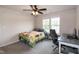 A bedroom with a ceiling fan and a desk perfect for working from home at 71 Hunters Way, Angier, NC 27501
