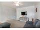 Cozy living room with neutral tones, a ceiling fan, and ample space for Gathering gatherings at 71 Hunters Way, Angier, NC 27501