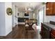 Open-concept living and dining area, adjacent to the kitchen, featuring hardwood flooring at 71 Hunters Way, Angier, NC 27501