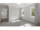 Comfortable bedroom offers neutral carpet, natural light and closet access at 7209 Halstead Ln, Raleigh, NC 27613