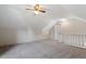 Spacious carpeted bedroom featuring a ceiling fan and access door, great for a room or guest suite at 7209 Halstead Ln, Raleigh, NC 27613